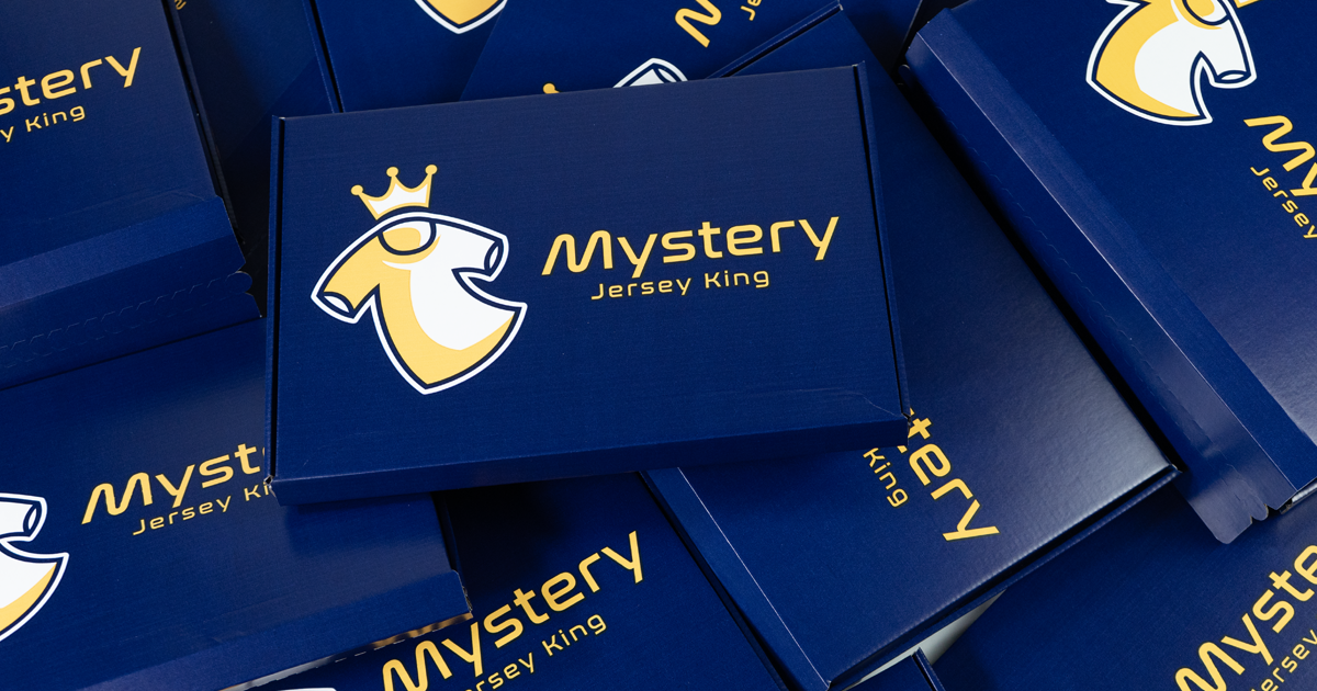 Mystery football shirt box from Mystery Jersey King next to a standard football kit showing the comparison